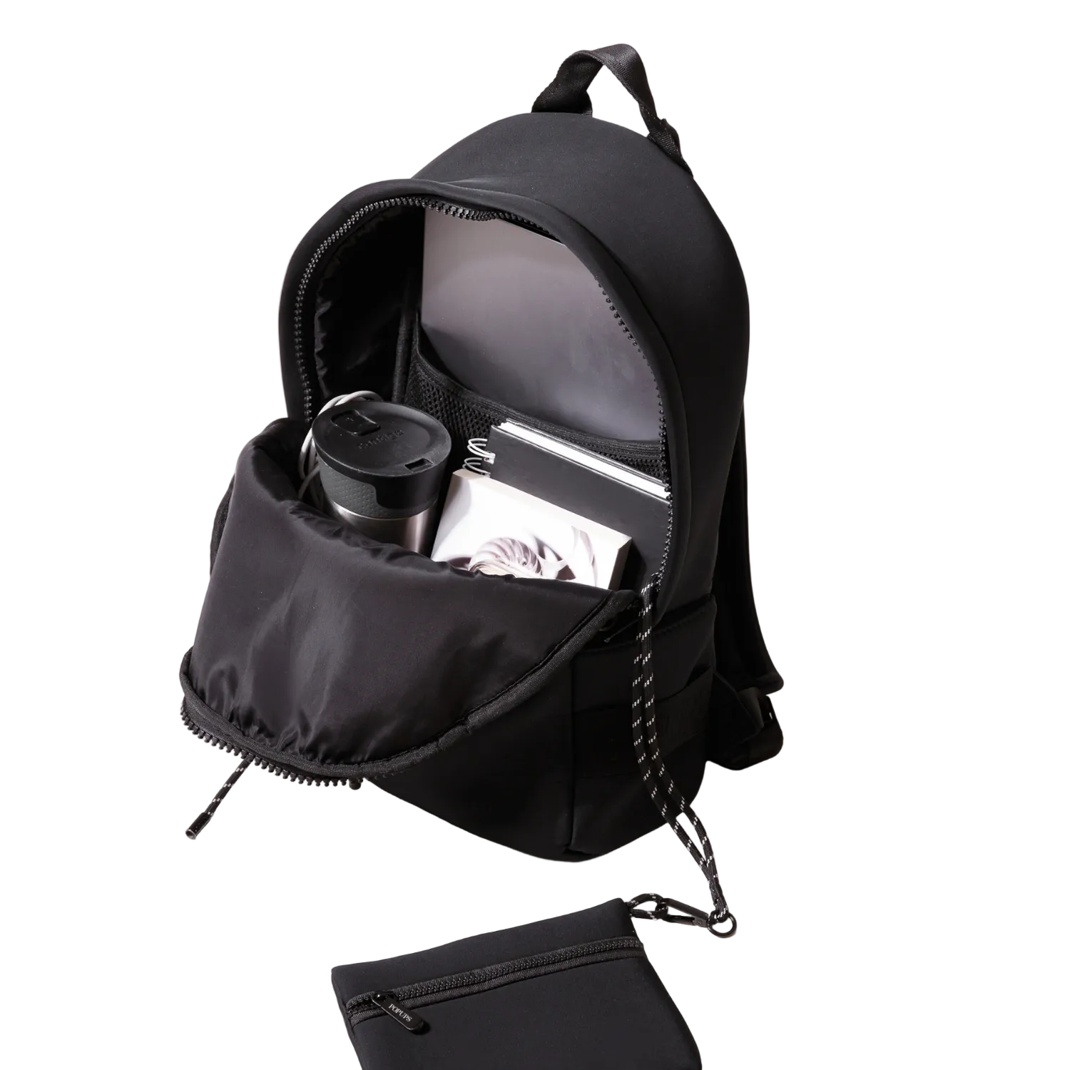 Black backpack with a water bottle and notebook on a white background