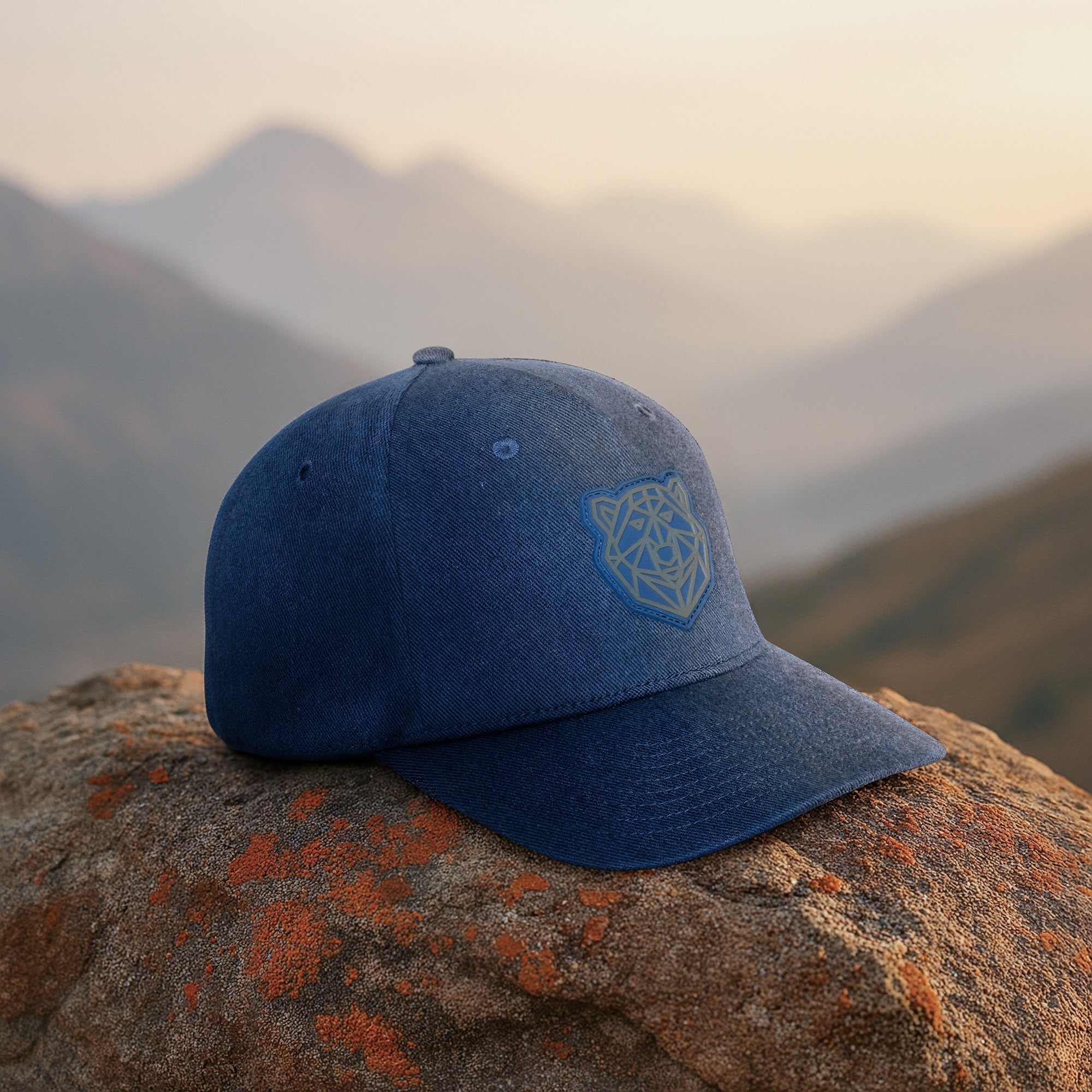 Arctic Protector II Cap by Tembo Collection – luxury polar bear hat, navy heather cotton twill, hidden wildlife photograph, supports Arctic conservation