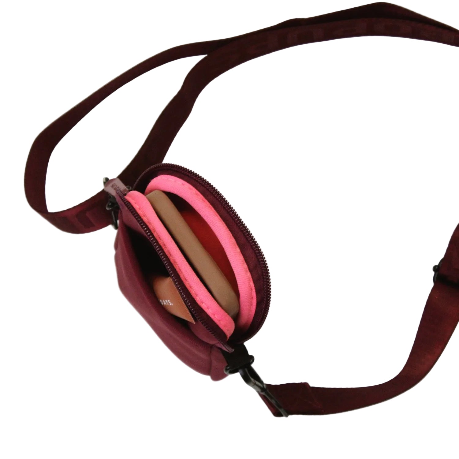 Maroon crossbody bag with pink interior on a white background