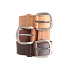Two leather belts with silver buckles on a white background