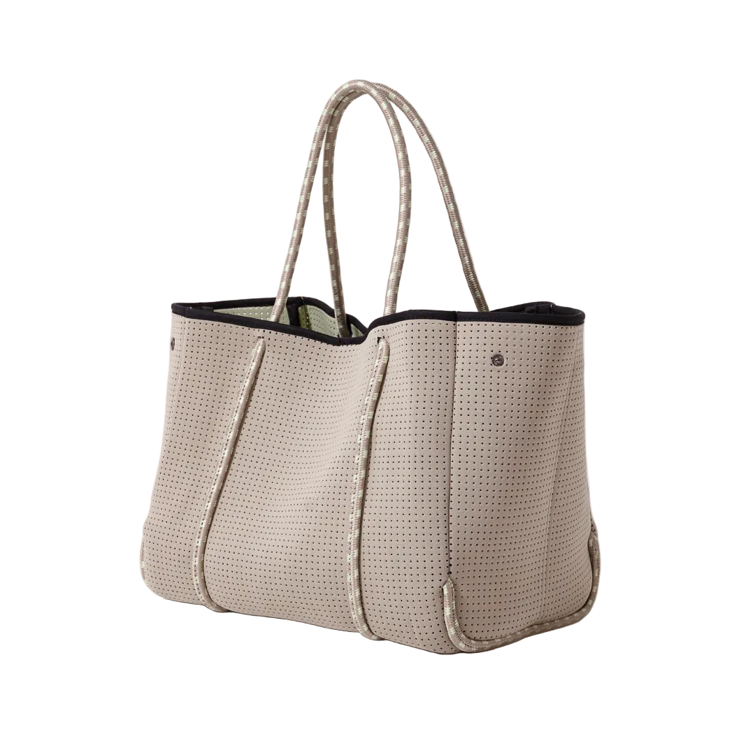 Beige textured tote bag with black interior on a white background