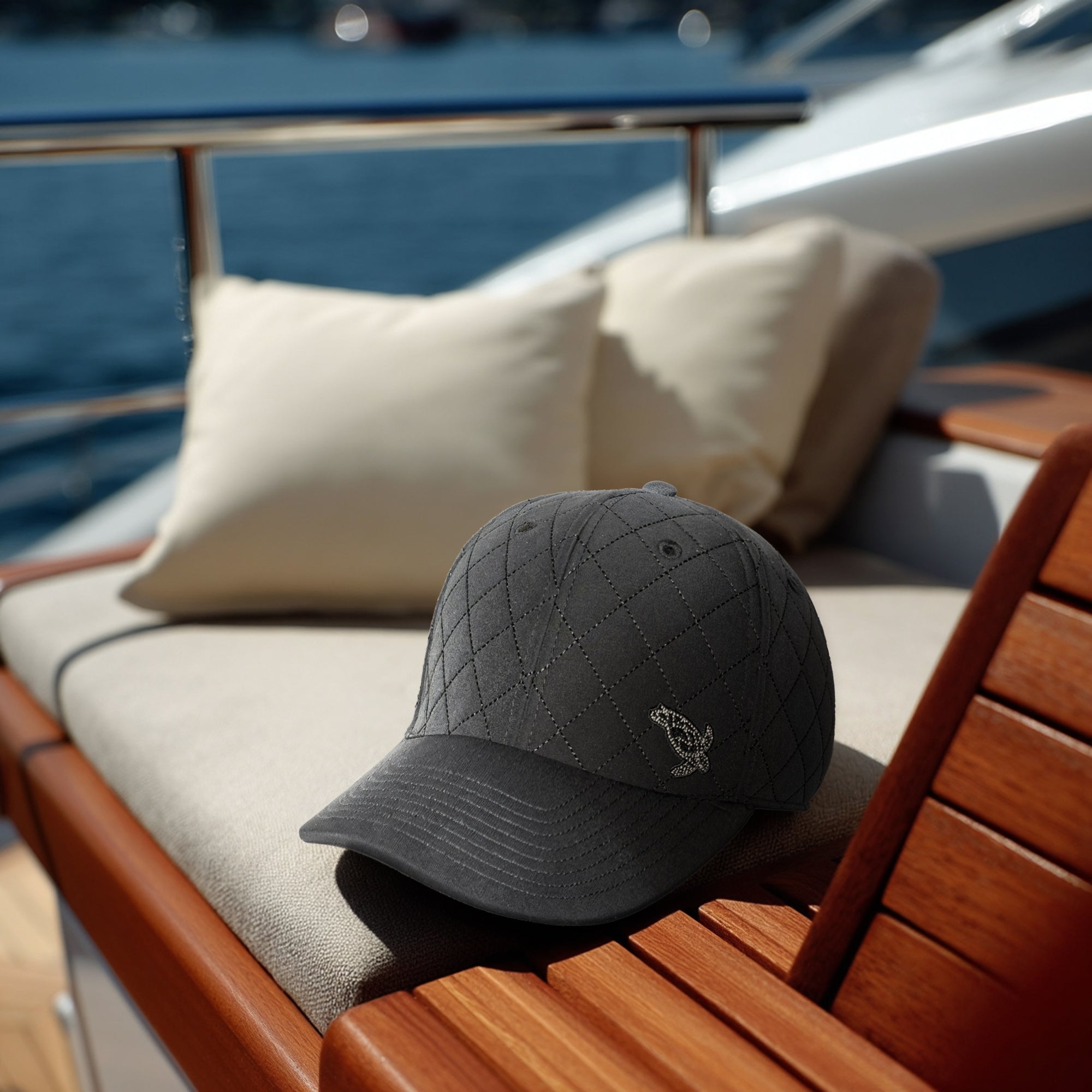 Gray cap on a wooden chair with a blurred background of water and boats